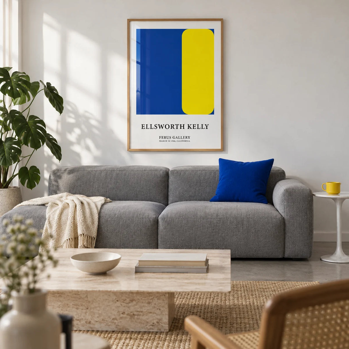 Minimalist Art Prints, framed on the wall of a design-led city flat living room with a white wall and a pale concrete floor