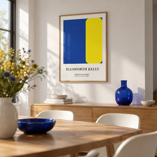 Minimalist Art Prints, framed on the wall of a modern dining room with a white wall
