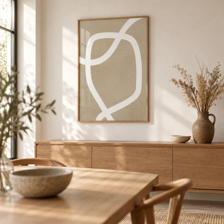 Minimalist Art Wall, framed on the wall of a warm minimalist dining room with a white wall