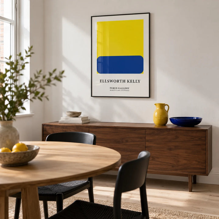 Minimalist Artwork, framed on the wall of a compact contemporary dining room in a UK terrace with a white wall and pale timber flooring