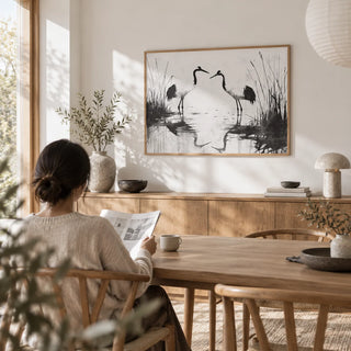 Minimalist Bird Art, framed on the wall of a bright Japandi dining room with a white wall