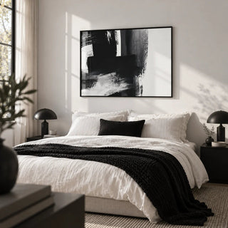 Minimalist Black And White Print, framed on the wall of a calm monochrome bedroom with a white wall
