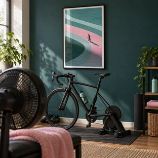 Minimalist Cycling Art Print, framed on the wall of a spare room bike training room with a dark teal painted wall