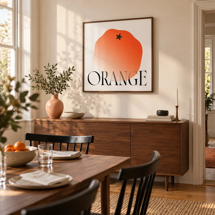 Minimalist Fruit Wall Art, framed on the wall of a contemporary dining room in a renovated UK terrace with a warm white wall and walnut furniture