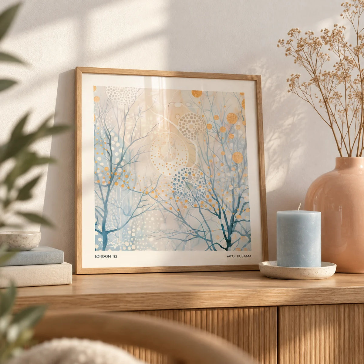 Minimalist Poster Art, a small A4 framed print leaning on an oak shelf in a living room