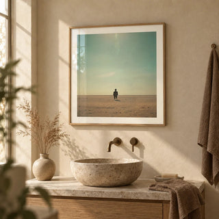 Minimalist Surrealism Art, framed on the wall of a calm stone bathroom