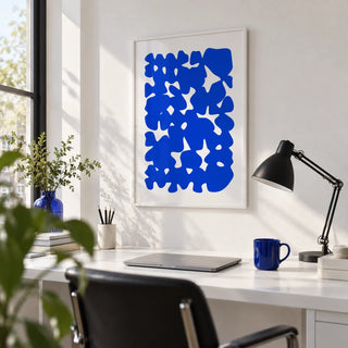 Modern Abstract Art, framed on the wall of a bright designer's home studio in a home office