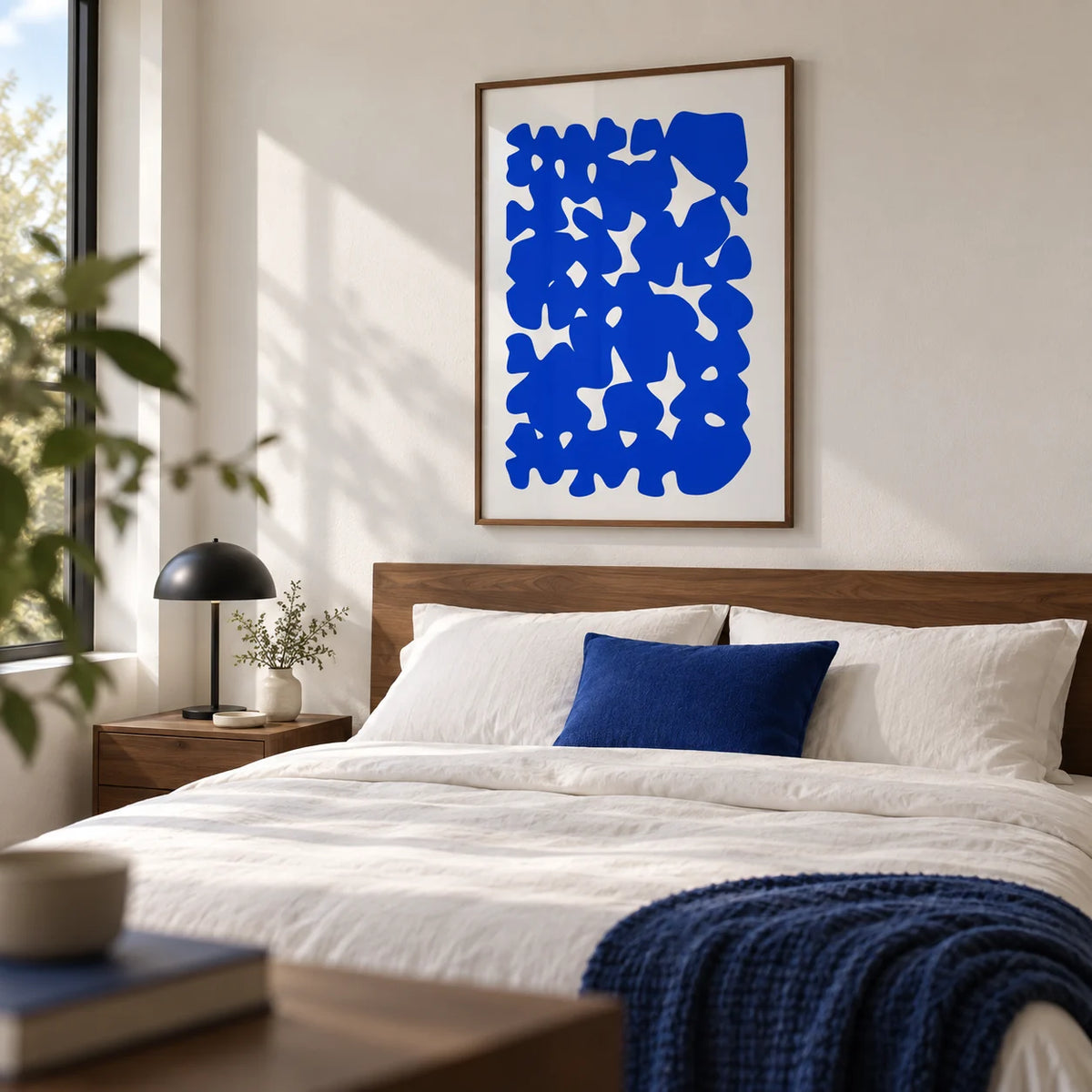 Modern Abstract Art, framed on the wall of a crisp modern bedroom