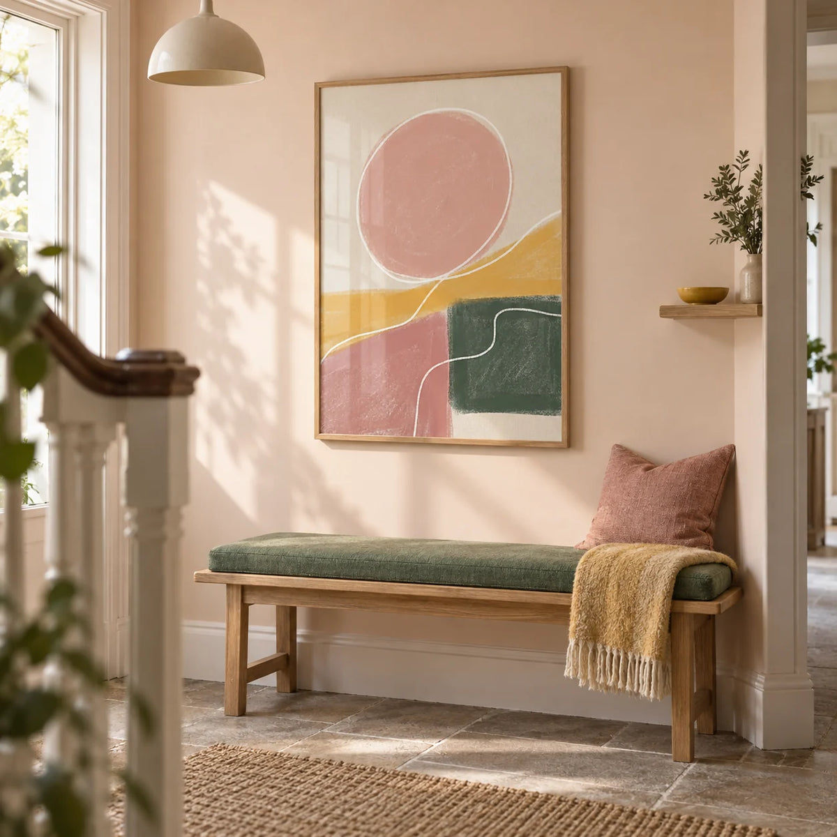 Modern Abstract Print, framed on the wall of a welcoming hallway in a renovated UK terrace with a pale peach wall and plain stone floor