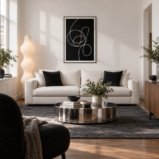 Modern Black And White Art, framed on the wall of a modern living room in a UK city flat with white walls