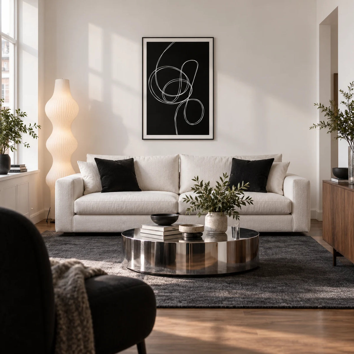 Modern Black And White Art, framed on the wall of a modern living room in a UK city flat with white walls