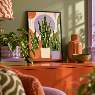 Modern Botanical Print, a small A4 framed print leaning on a colourful lacquered shelf in a living room
