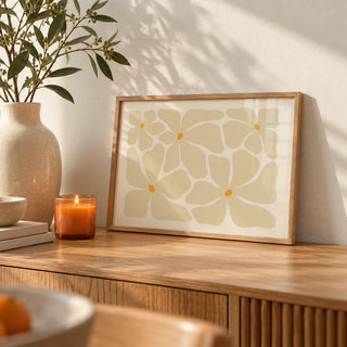 Modern Floral Poster, a small A4 framed print leaning on an oak sideboard in a living room