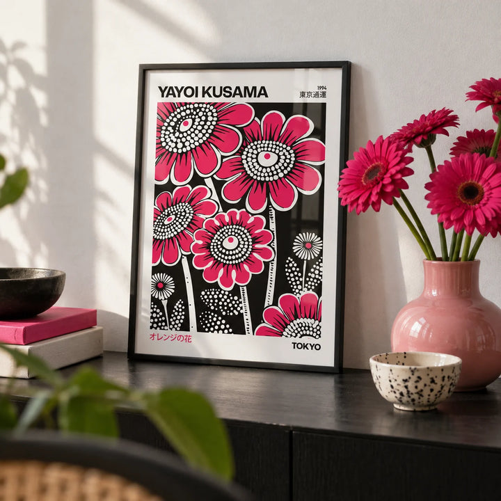 Modern Floral Wall Art, a small A4 framed print leaning on a black shelf in a living room