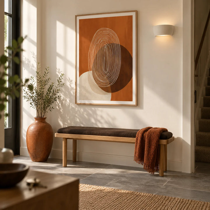Modern Geometric Print, framed on the wall of a modern entrance hallway in a UK townhouse with a warm white wall and a plain grey stone floor