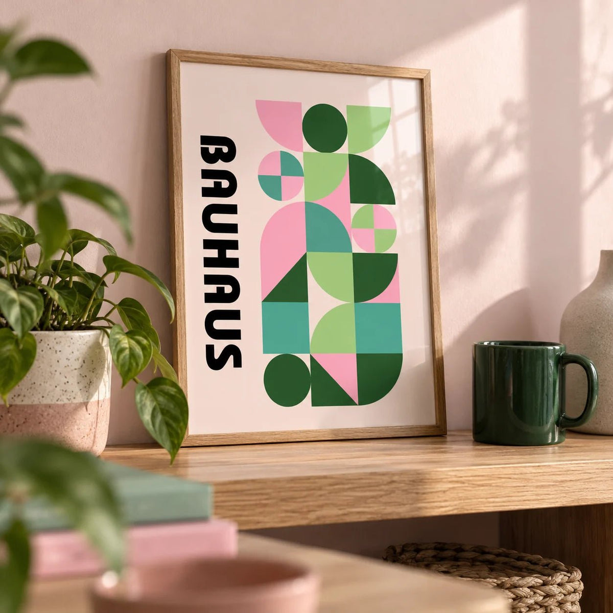 Modern Graphic Print, a small A4 framed print leaning on an oak shelf in a living room