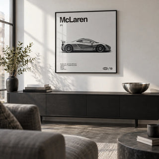 Modern Hybrid Hypercar Poster, framed on the wall of a design-led city flat living room with a white wall and a concrete floor