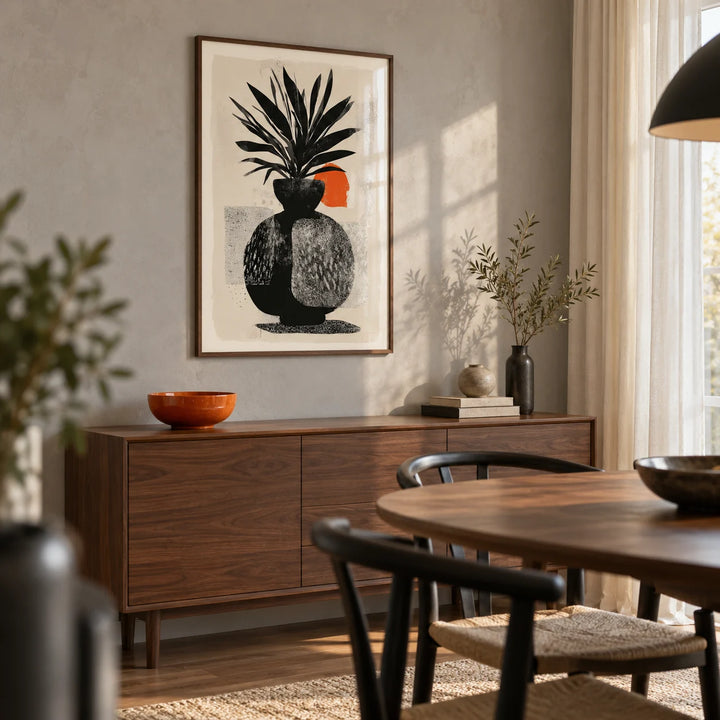 Modern Indian Sun Plant Wall Art, framed on the wall of a modern dining room in a renovated terraced house with a pale grey plaster wall