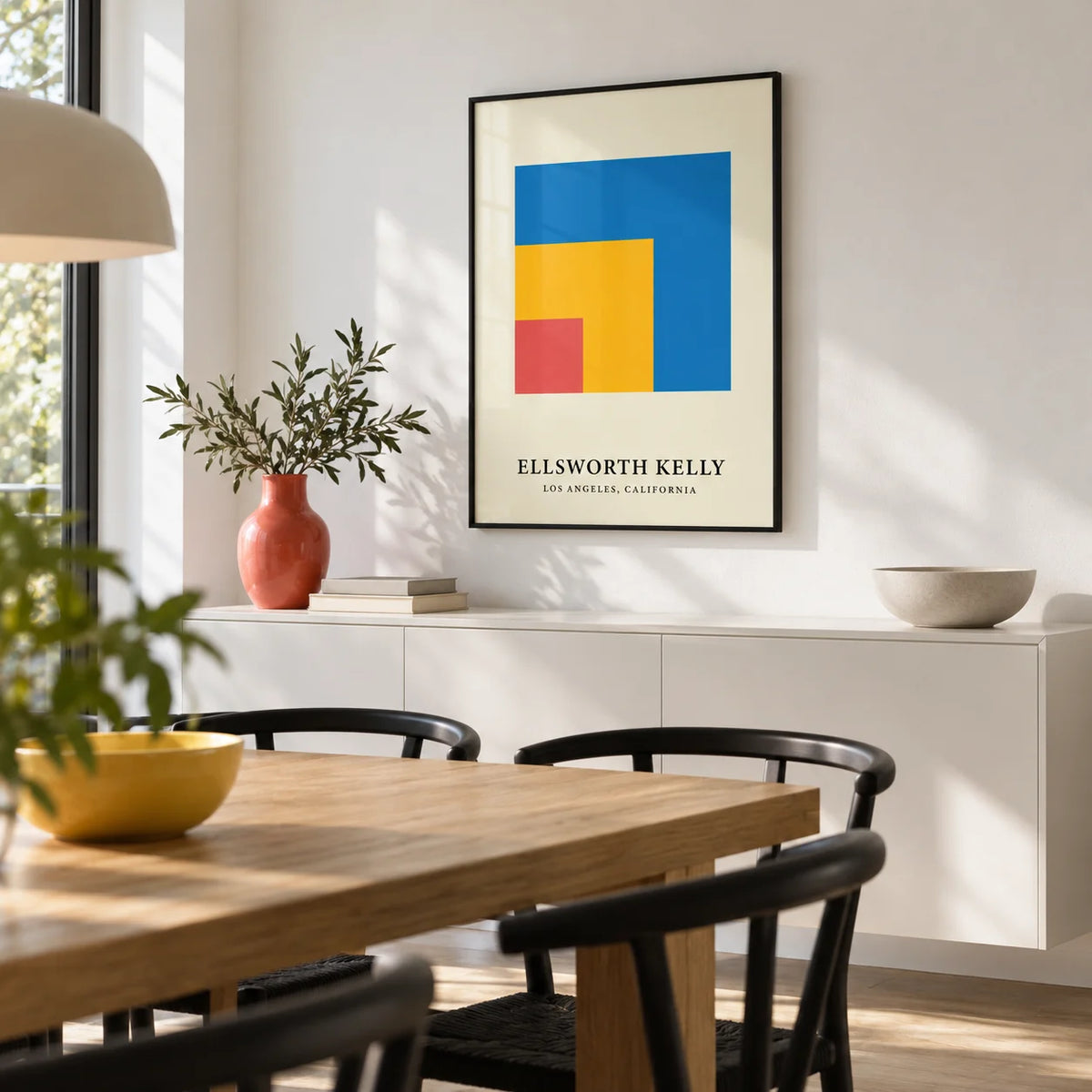 Modern Minimal Wall Art, framed on the wall of a modern dining room with a white wall