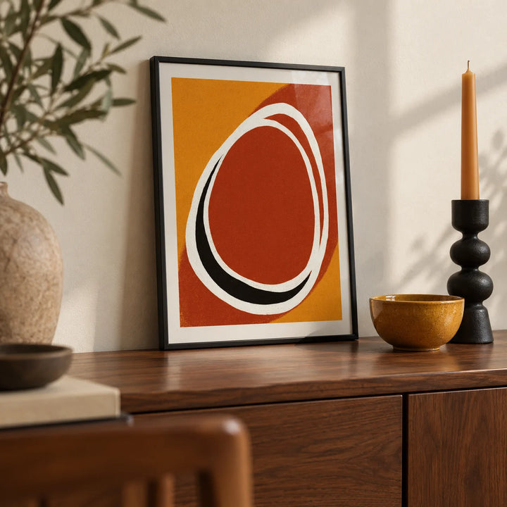 Modern Minimalist Art Print, a small A4 framed print leaning on a walnut sideboard in a living room