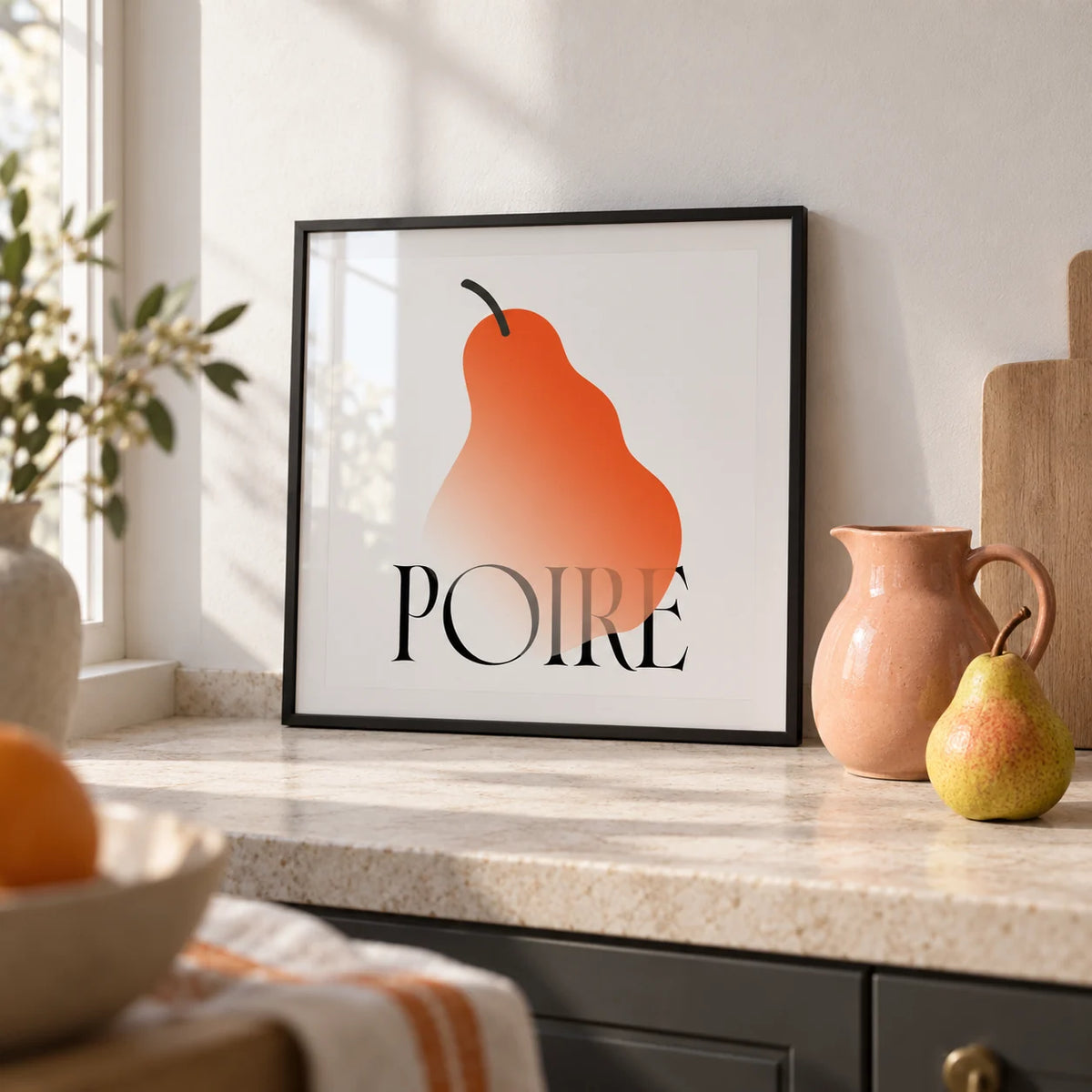 Modern Pear Poster, a small A4 framed print leaning on a pale stone kitchen worktop