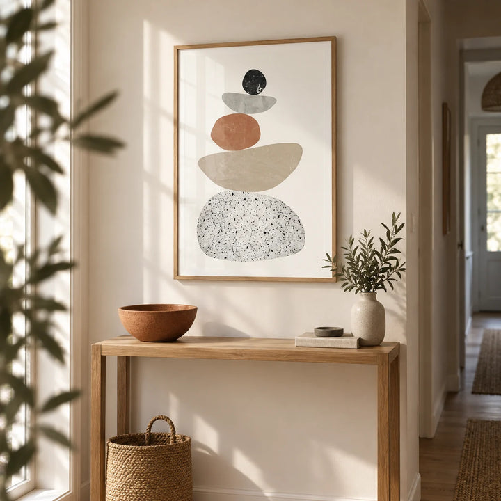 Modern Pebble Print, framed on the wall of a calm hallway with a warm white wall