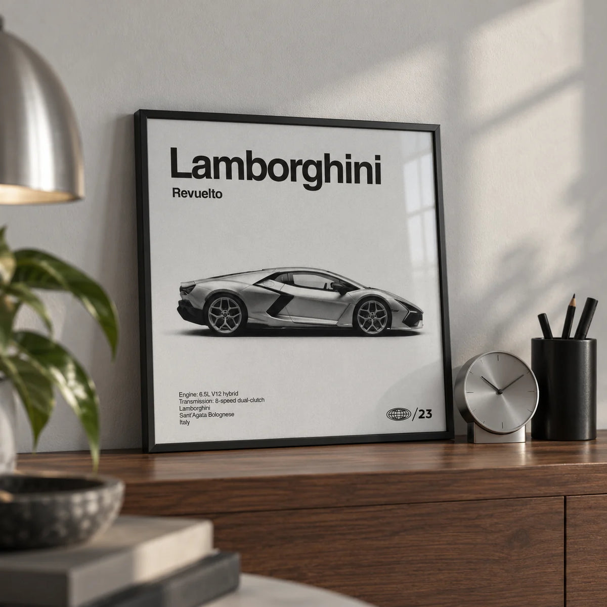 Modern Supercar Art Print, a small A4 framed print leaning on a walnut shelf in a home office