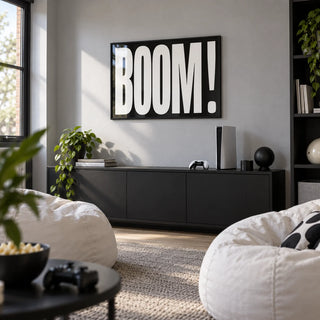 Modern Typography Wall Art, framed on the wall of a games room in a family home with a light grey wall in a hallway