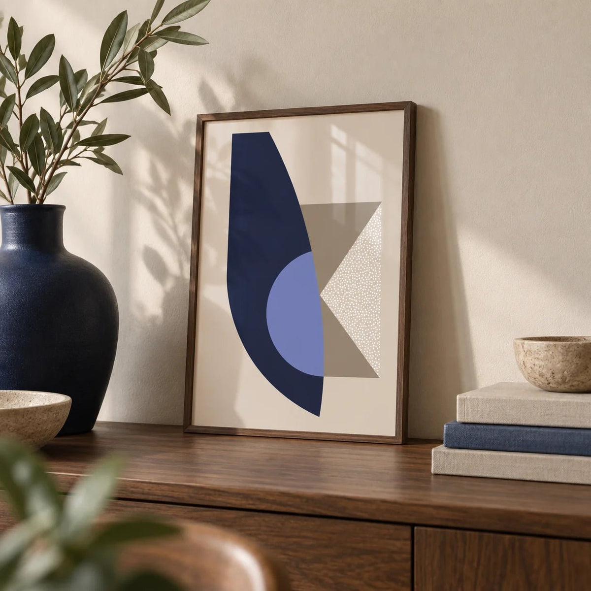 Modern Wall Art Print, a small A4 framed print leaning on a walnut shelf in a living room