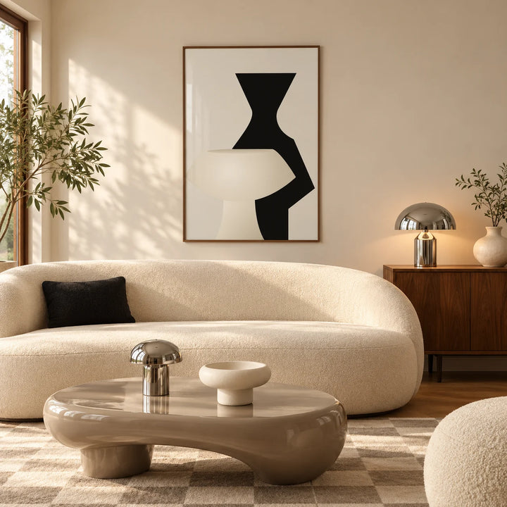 Modern Wall Art, framed on the wall of a warm mid-century living room with a curved boucle sofa and a glossy coffee table