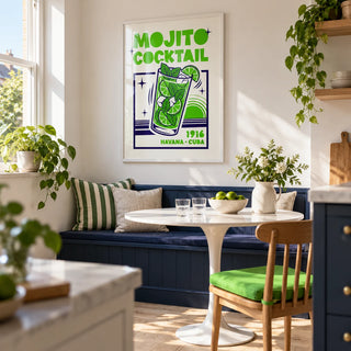 Mojito Cocktail Print, framed on the wall of a bright kitchen breakfast nook in a UK maisonette with a white wall and a built-in deep navy bench