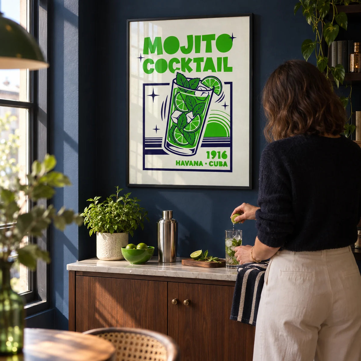 Mojito Cocktail Print, framed on the wall of a compact home bar alcove in a design-led UK flat with a deep navy painted wall in a living room