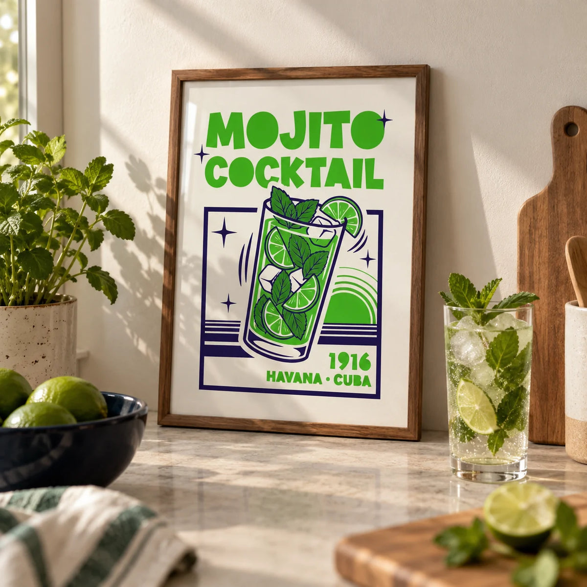 Mojito Cocktail Print, a small A4 framed print leaning on a pale stone kitchen worktop