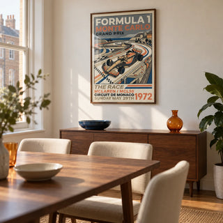 Monte Carlo Retro Racing Poster, framed on the wall of a compact dining room in a UK city flat with warm white plaster walls and a vintage walnut dining table