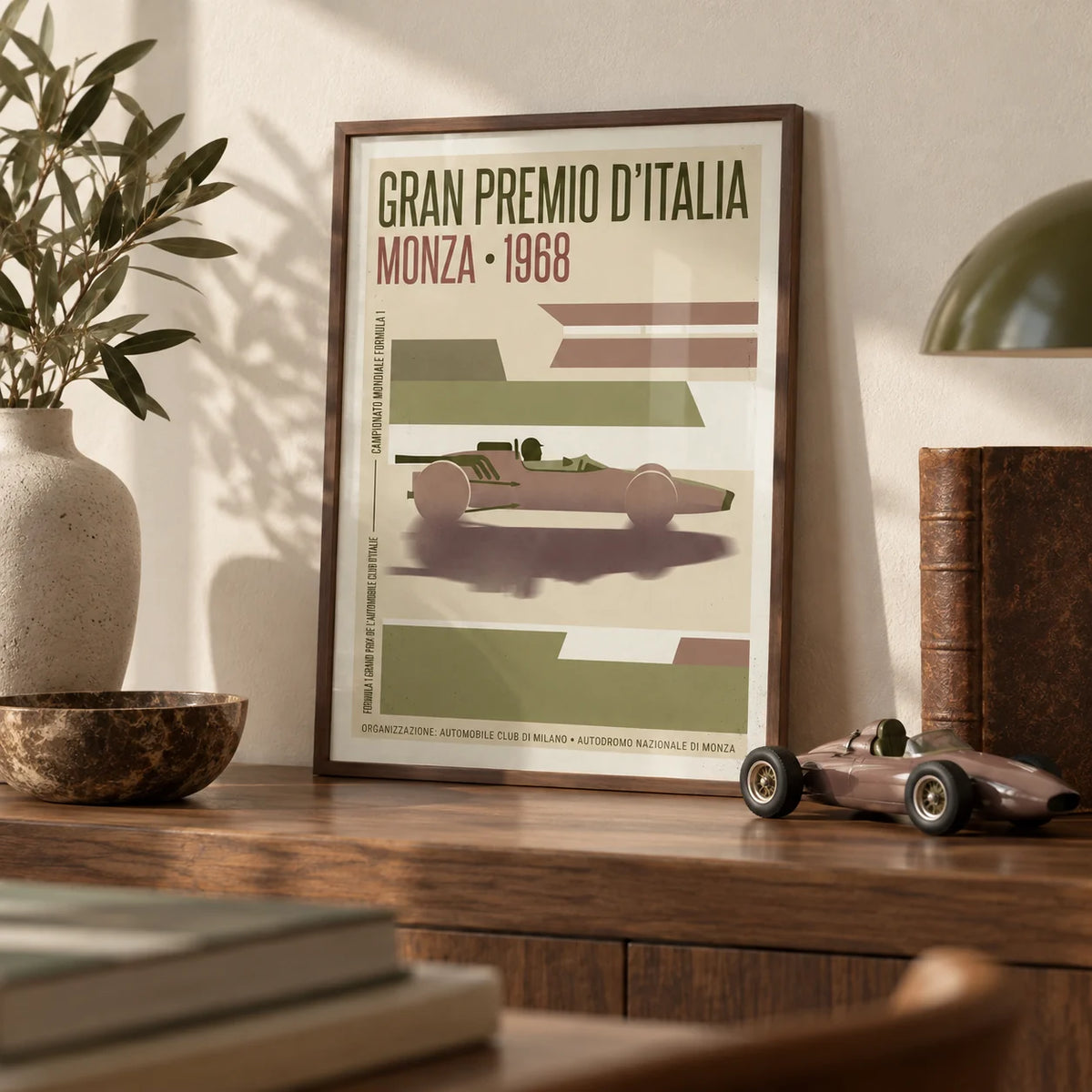Monza Grand Prix Poster, a small A4 framed print leaning on a walnut shelf in a living room