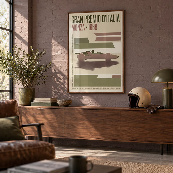 Monza Grand Prix Poster, framed on the wall of a smart converted garage den with a mauve-grey painted brick wall and a polished concrete floor in a living room