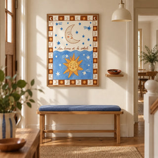 Moon And Sun Print, framed on the wall of a welcoming hallway in a young family terrace with a cream wall and warm timber flooring