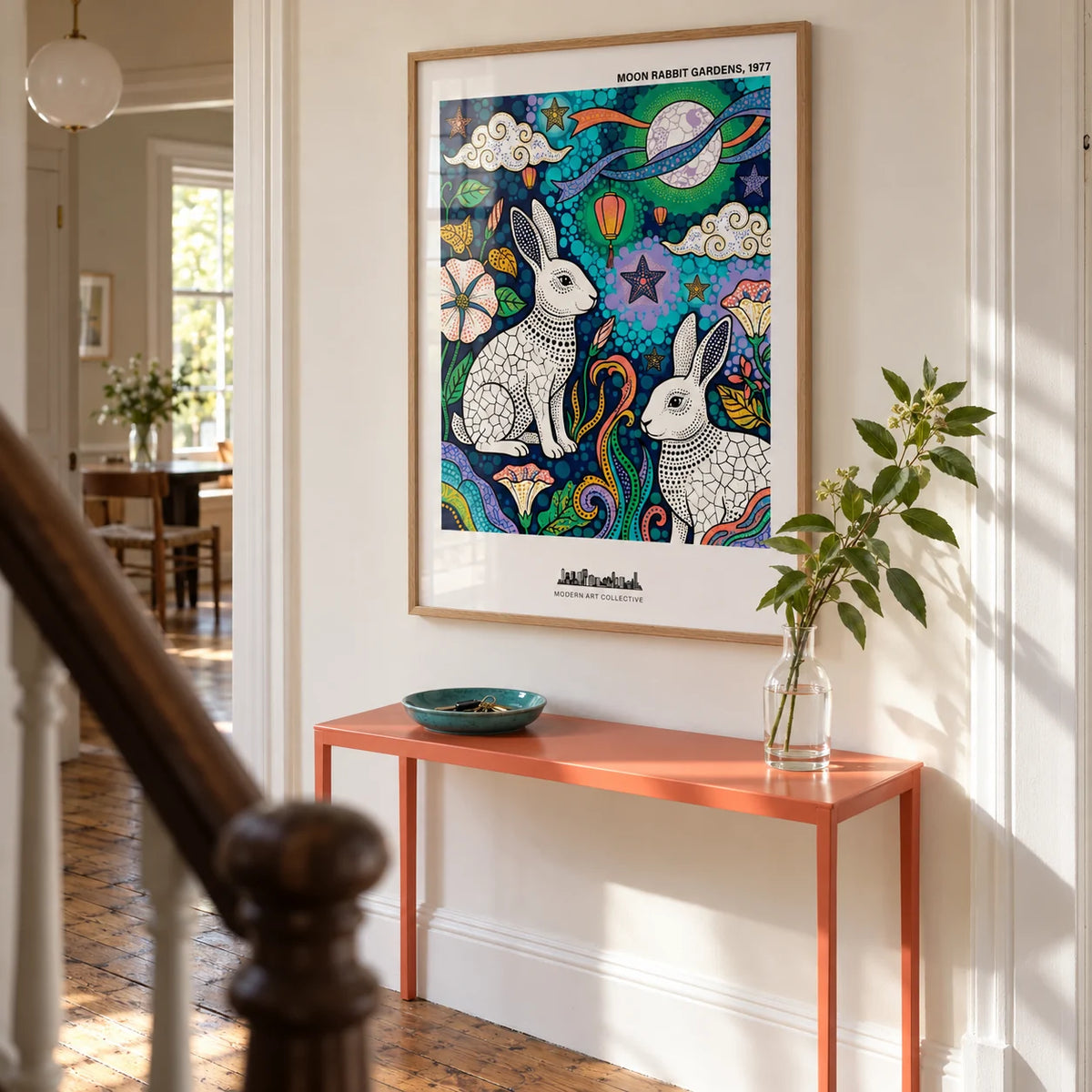 Moon Garden Art Print, framed on the wall of a bright hallway in a UK Victorian terrace with warm white walls and original timber floorboards