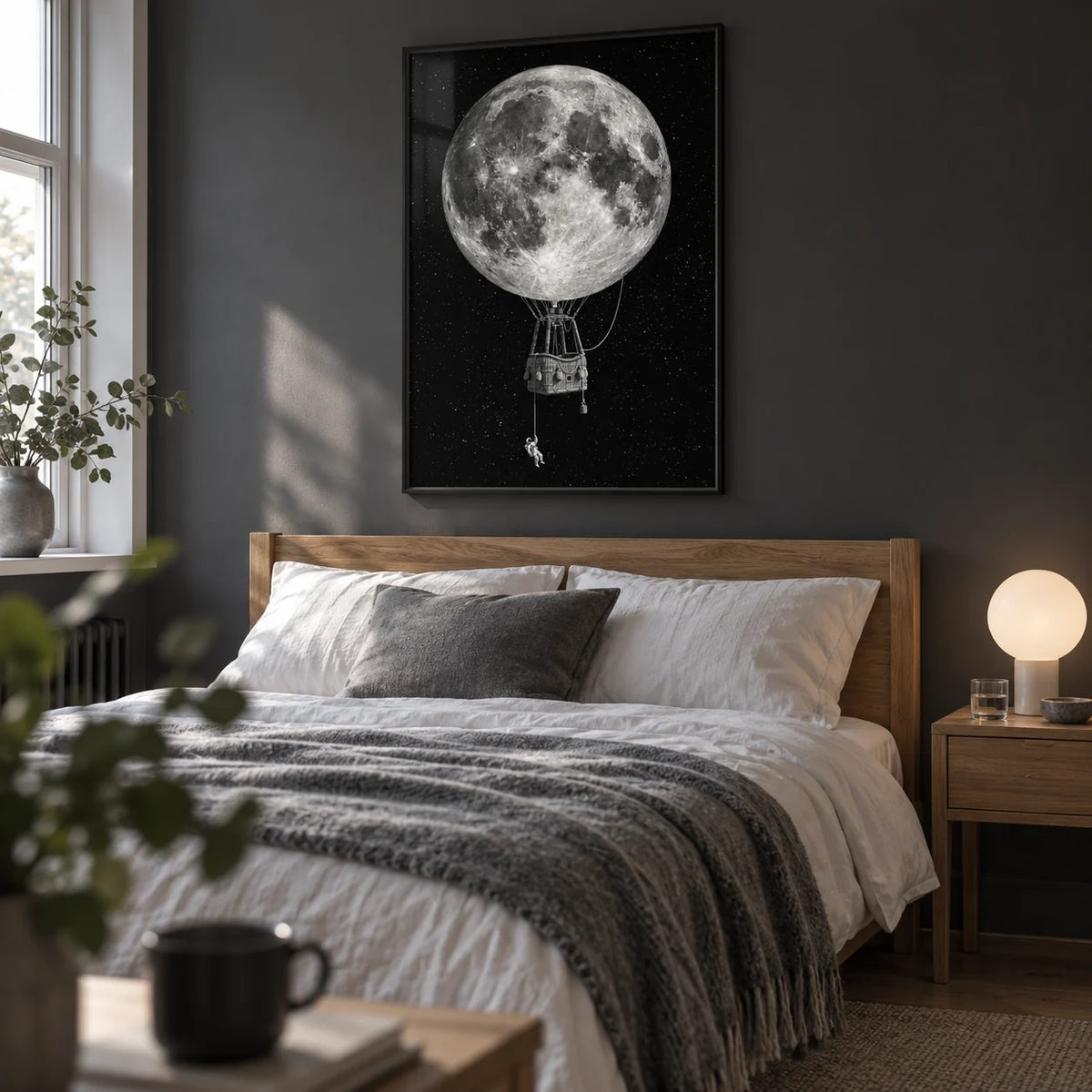 Moon Hot Air Balloon Art, framed on the wall of a restful adult bedroom in a modest UK flat with a muted charcoal wall