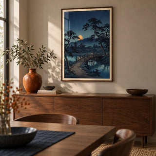 Moonlit Bridge Art Print, framed on the wall of a calm dining room with a soft greige wall