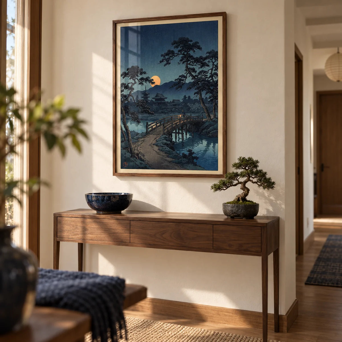 Moonlit Bridge Art Print, framed on the wall of a calm hallway with a warm white wall