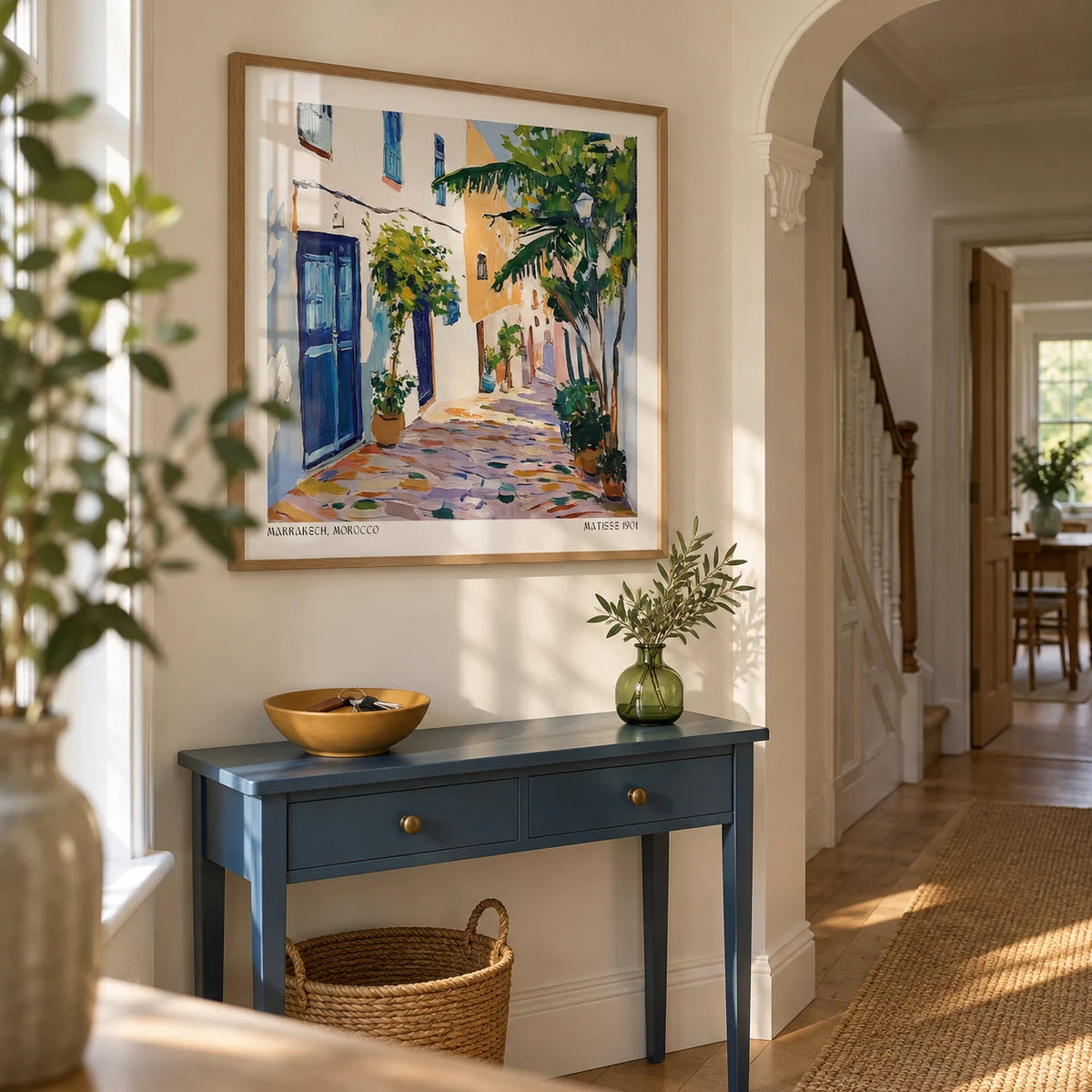 Morocco Wall Art, framed on the wall of a welcoming hallway in a renovated UK terrace with warm white walls and an arched doorway