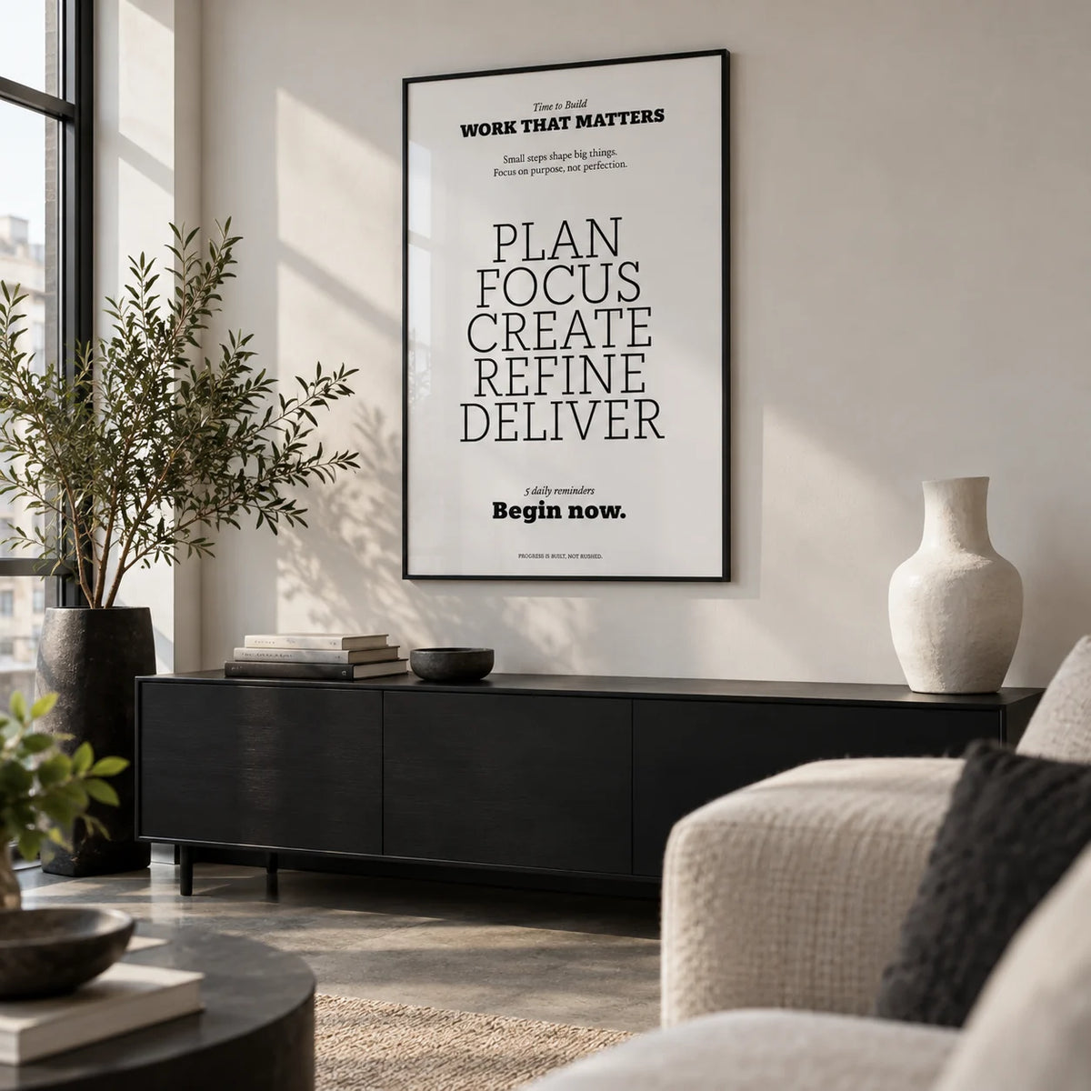Motivate Quote Poster, framed on the wall of a design-led city flat living room with a polished concrete floor