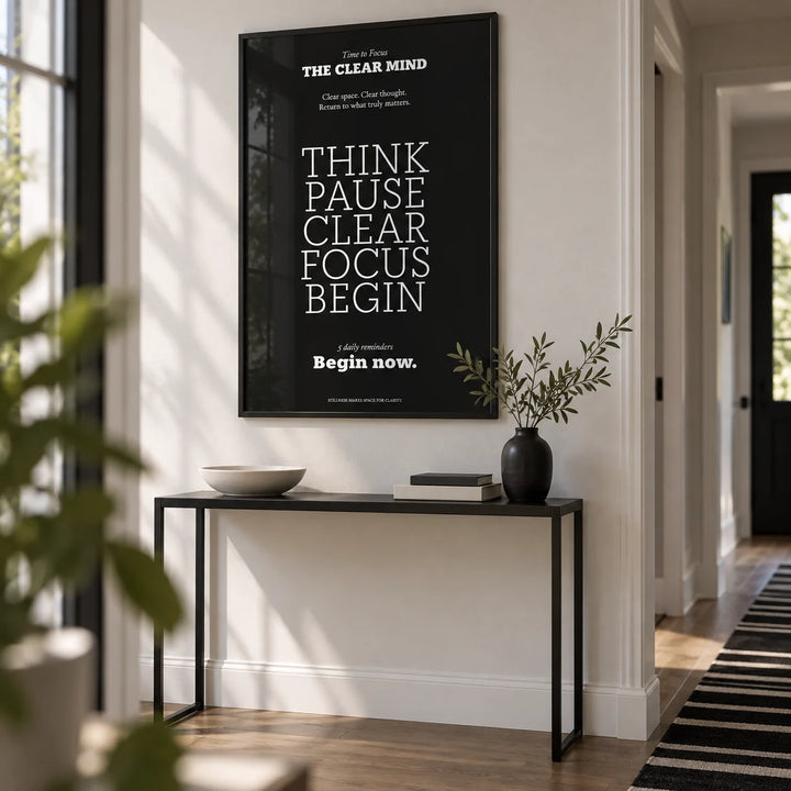 Motivational Quote Prints, framed on the wall of a crisp hallway with a white wall and a black and white floor runner
