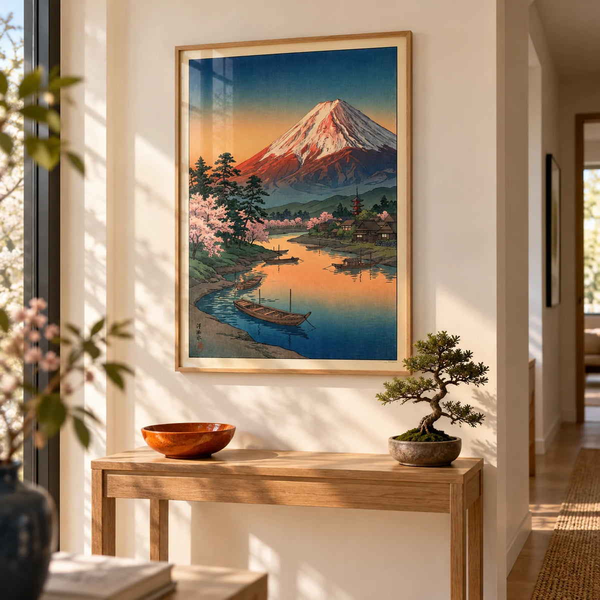 Mount Fuji Sunset Poster, framed on the wall of a bright hallway with a warm white wall