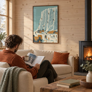Mountain Climbing Art Print, framed on the wall of a cabin-style living room with pale timber walls