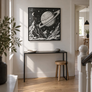 Mountain Space Poster, framed on the wall of a crisp hallway in a renovated UK terraced house with a white wall and natural oak flooring