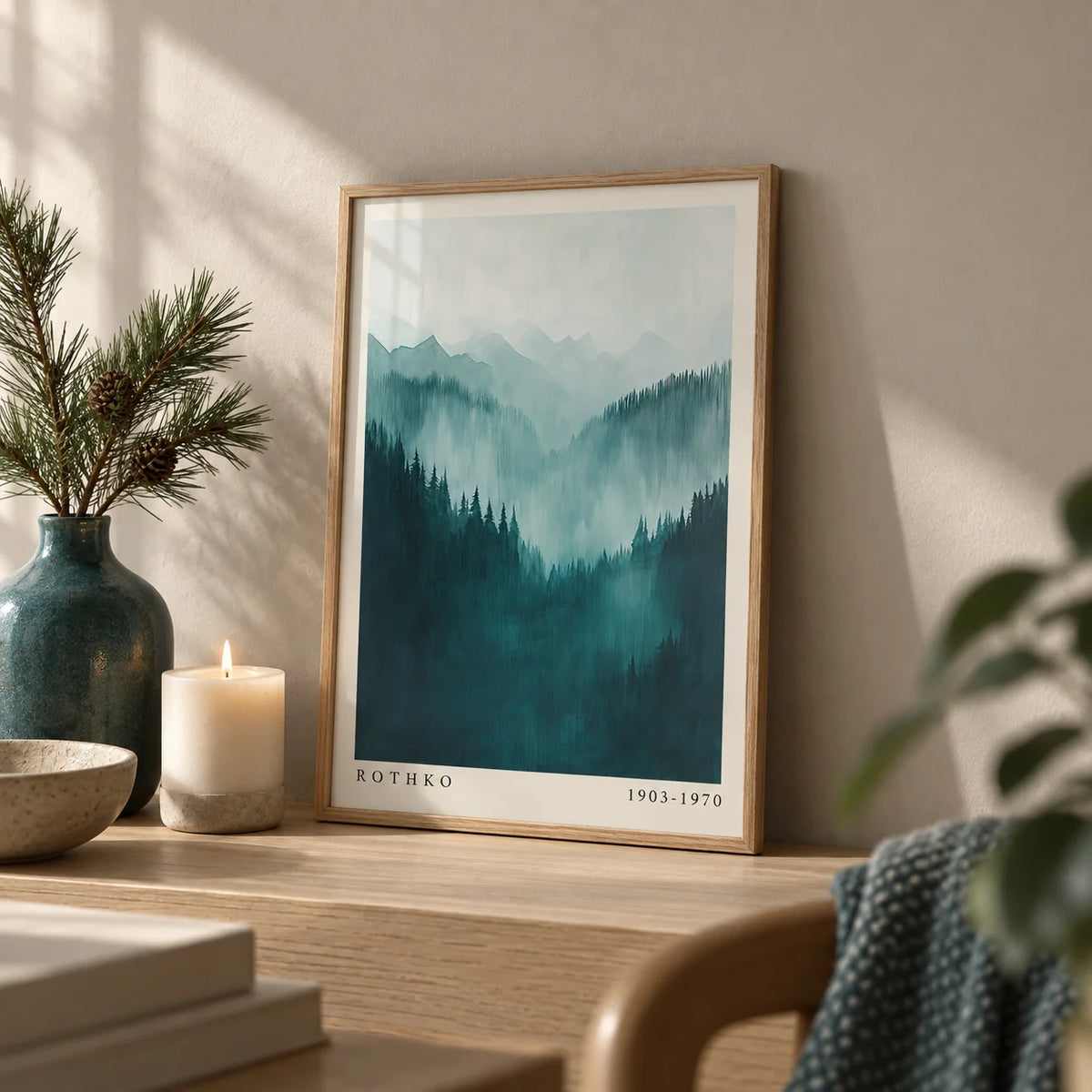 Mountain Wall Art, a small A4 framed print leaning on a pale oak shelf in a living room