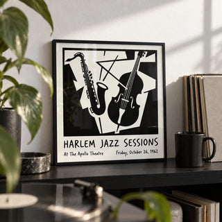 Music Poster Wall Art, a small A4 framed print leaning on a black shelf in a living room