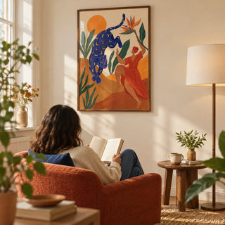 Mystical Blue Leopard Wall Art, framed on the wall of a sunlit reading corner in a UK first home for an adult aged 25-35 with a warm cream wall in a living room